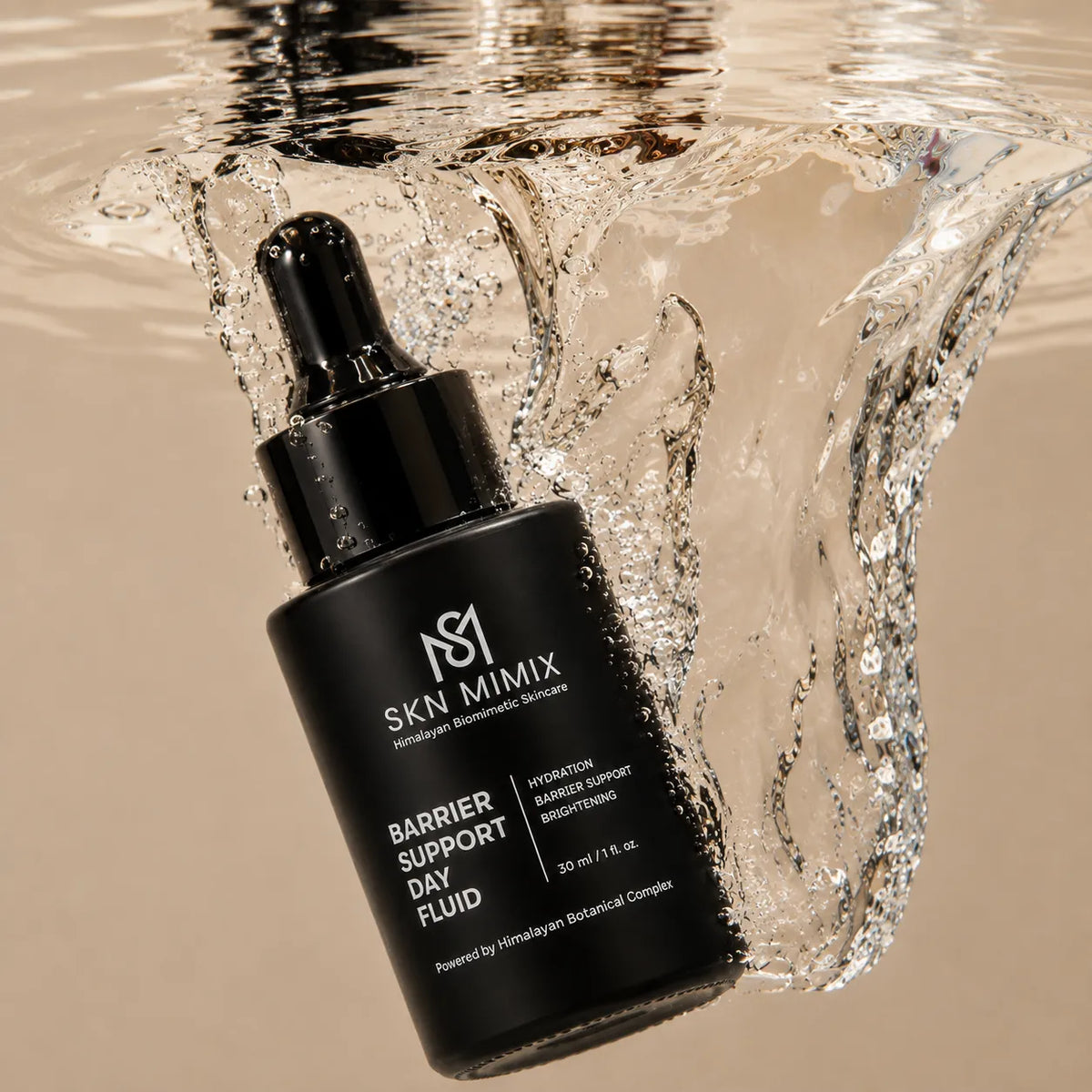 A black dropper bottle of SKN Mimix Barrier Support Day Fluid floating in a splash of water against a warm beige background.